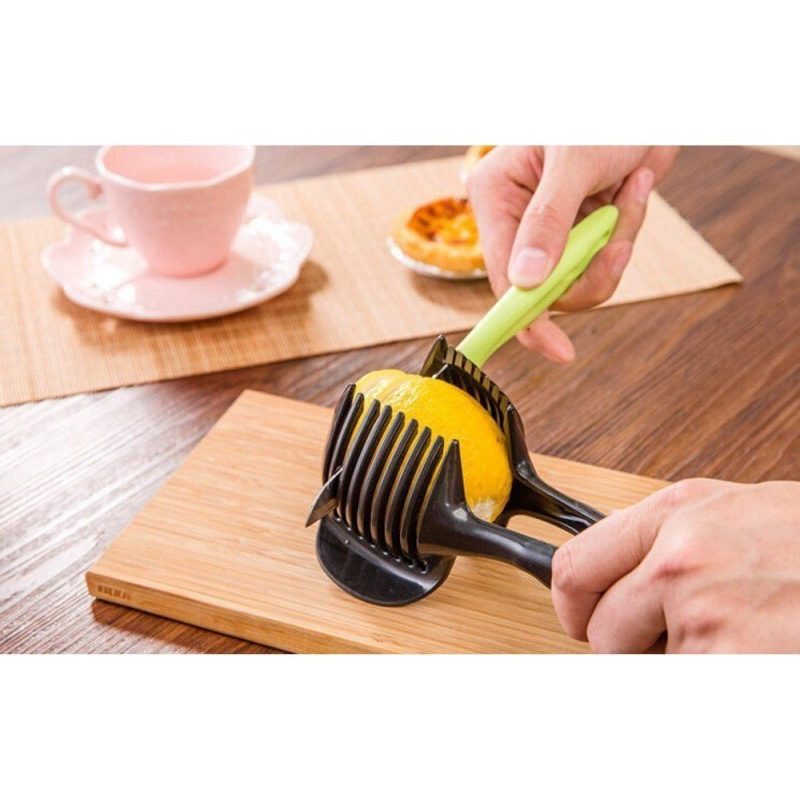 Pinza taglio verdura frutta cucina affettare arance pomodori mele fettine