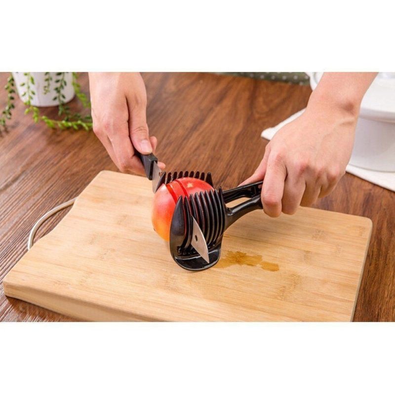 Pinza taglio verdura frutta cucina affettare arance pomodori mele fettine