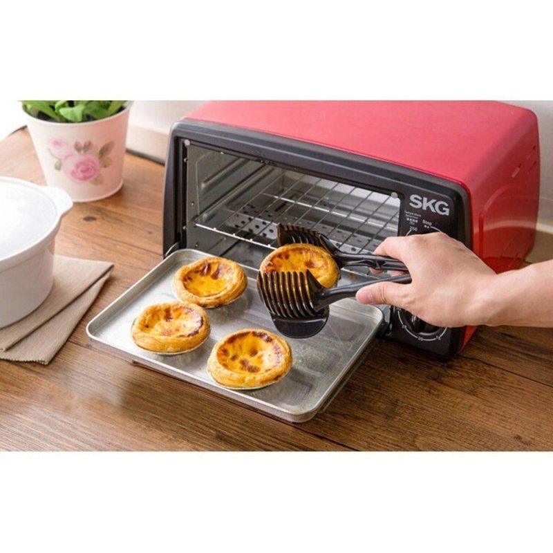 Pinza taglio verdura frutta cucina affettare arance pomodori mele fettine
